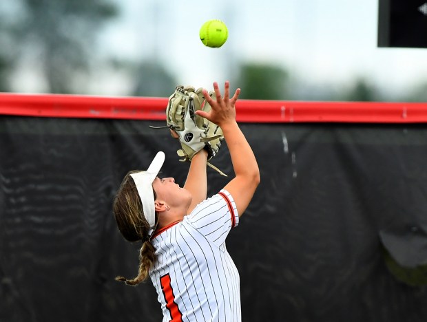 Oswego's Savannah Page (1) catches a deep fly in the outfield. Oswego defeated Mundelein 12-7 in the Class 4A third-place game at Louisville Slugger Sports Complex in Peoria.(Rob Dicker / Daily Southtown)