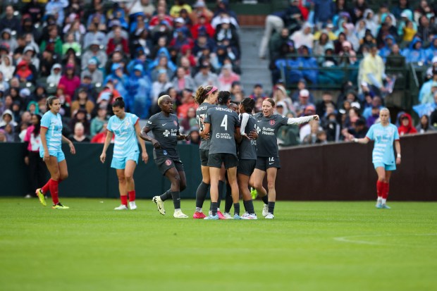 Bay FC players celebrate after scoring during the game against the Chicago Red Stars at Wrigley Field on June 8, 2024. (Eileen T. Meslar/Chicago Tribune)