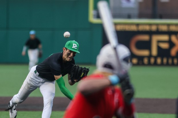 Providence's Kasten Goebbert (22) throws a pitch during the Class 4A State Championship game against Conant in Joliet on Saturday, June 8, 2024. (Troy Stolt/for the Daily Southtown)