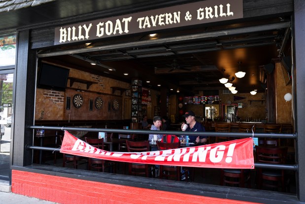 Barbara and Ed Udall, of Atlanta, eat food at the newly opened Billy Goat Tavern in Wrigleyville on June 6, 2024. (Eileen T. Meslar/Chicago Tribune)