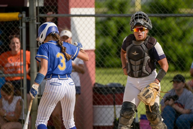 Oswego's Kiyah Chavez (10) works behind the plate against Wheaton North during the Class 4A Plainfield North Sectional final in Plainfield on Friday, May 31, 2024. (Mark Black / for the Beacon-News)
