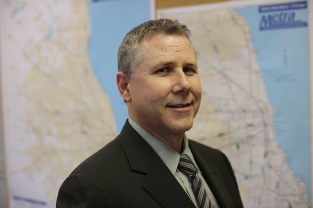 Metra CEO Alex Clifford in his office on April 9, 2013. (E. Jason Wambsgans/Chicago Tribune)