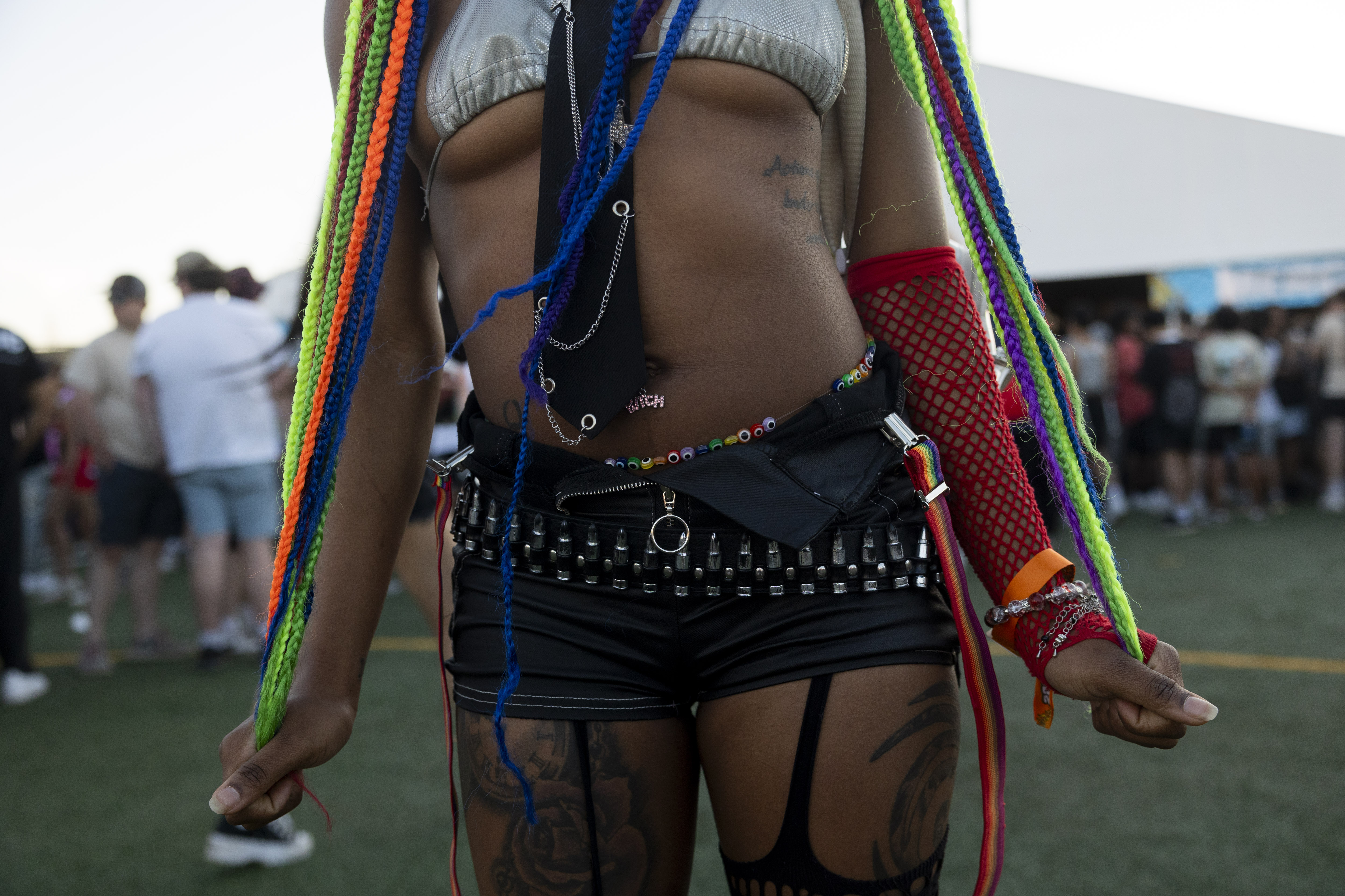 A woman who goes by the name Tiny poses for a portrait on June 14, 2024, at the Summer Smash Music Festival at SeatGeek Stadium in Bridgeview. (Vincent Alban/Chicago Tribune)