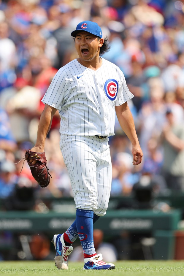 Cubs starter Shota Imanaga yells after striking out Cardinals left fielder Brendan Donovan to end the seventh inning on June 15, 2024, at Wrigley Field. (Michael Reaves/Getty)