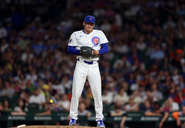 Chicago Cubs pitcher Hayden Wesneski (19) comes in for Chicago Cubs pitcher Luke Little (43) in the top of the sixth inning against the San Francisco Giants at Wrigley Field on June 17, 2024, in Chicago. (Stacey Wescott/Chicago Tribune)