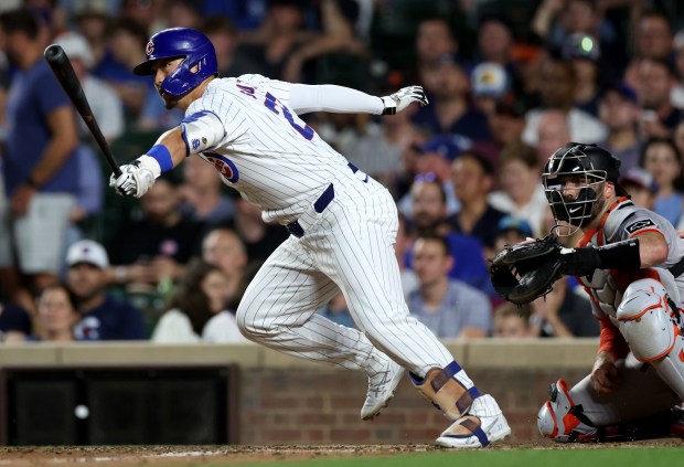 Chicago Cubs designated hitter Seiya Suzuki (27) singles in the 8th inning of a game against the San Francisco Giants at Wrigley Field in Chicago on June 18, 2024. (Chris Sweda/Chicago Tribune)