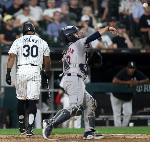 Chicago White Sox batter Corey Julks (30) walks to the dugout after striking out in the ninth inning of a game against the Houston Astros at Guaranteed Rate Field in Chicago on June 19, 2024. (Chris Sweda/Chicago Tribune)