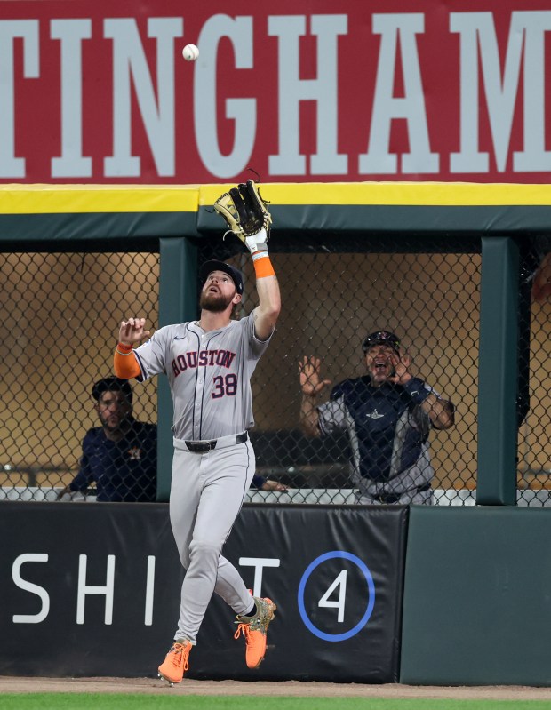 Houston Astros outfielder Trey Cabbage (38) catches a long fly ball hit by Chicago White Sox third baseman Lenyn Sosa in the ninth inning of a game at Guaranteed Rate Field in Chicago on June 19, 2024. (Chris Sweda/Chicago Tribune)