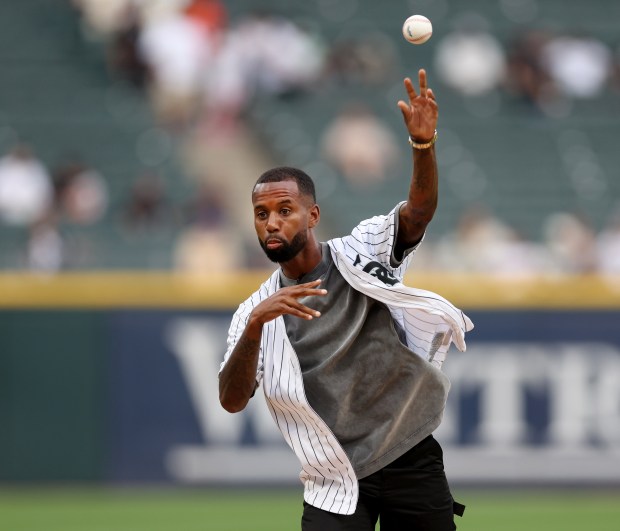 Chicago Fire soccer player Kellyn Acosta throws out a ceremonial first pitch before a game between the Chicago White Sox and the Houston Astros at Guaranteed Rate Field in Chicago on June 19, 2024. (Chris Sweda/Chicago Tribune)