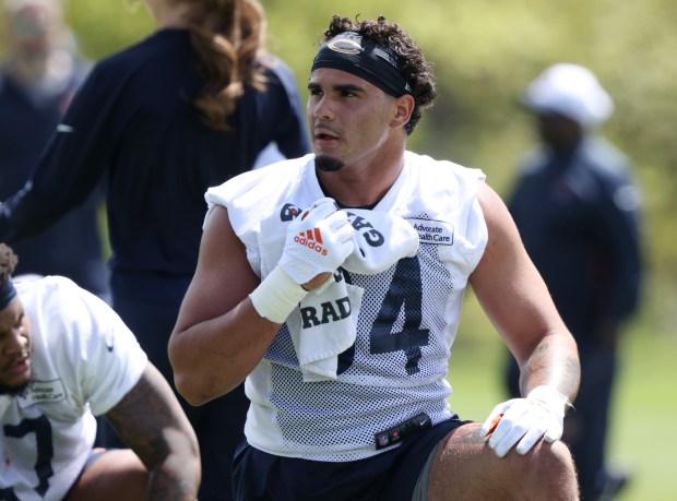 Defensive lineman Austin Booker stretches during Bears rookie minicamp at Halas Hall on May 11, 2024. (John J. Kim/Chicago Tribune)