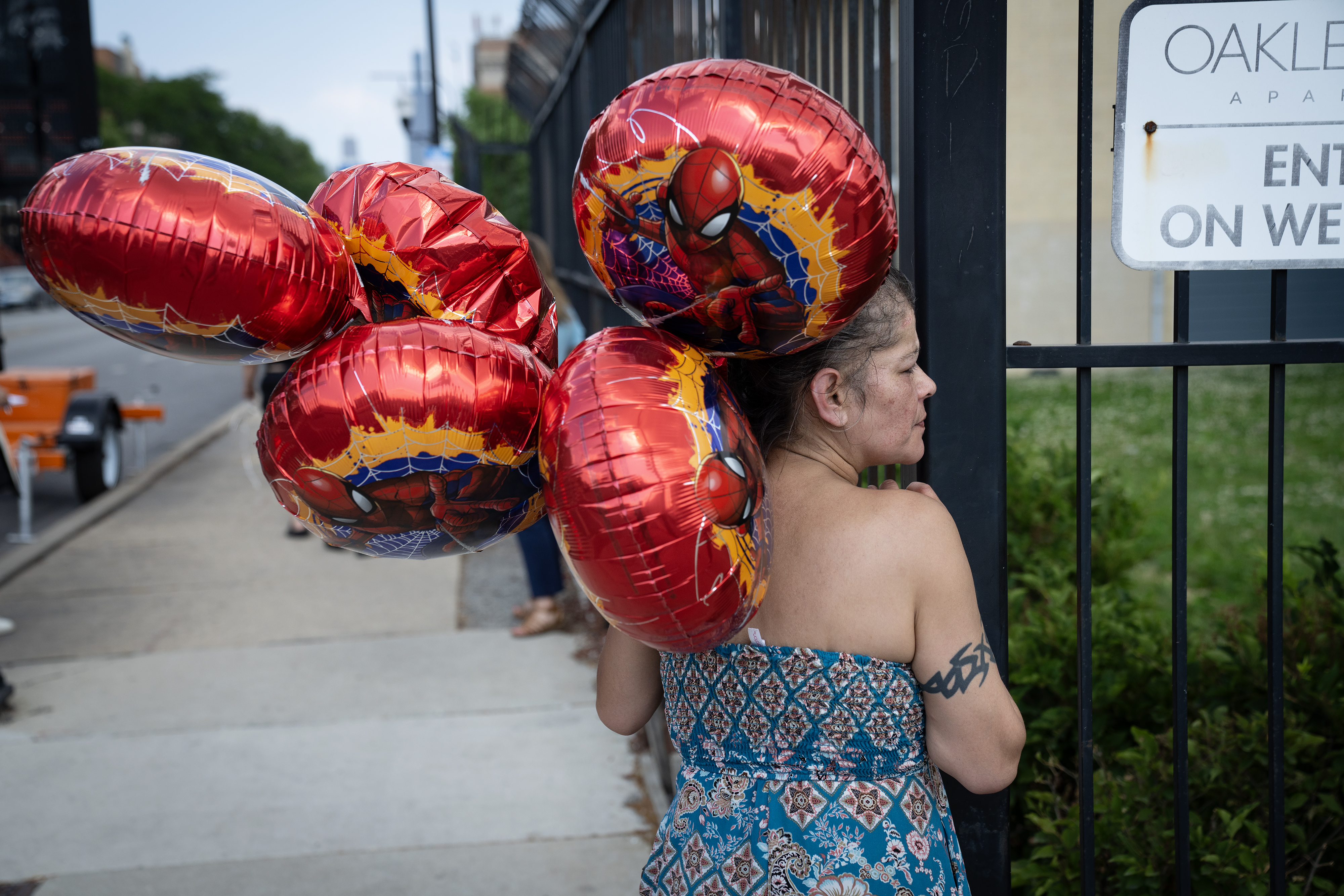 Neighbors begin to gather at a memorial, June 19, 2024,...