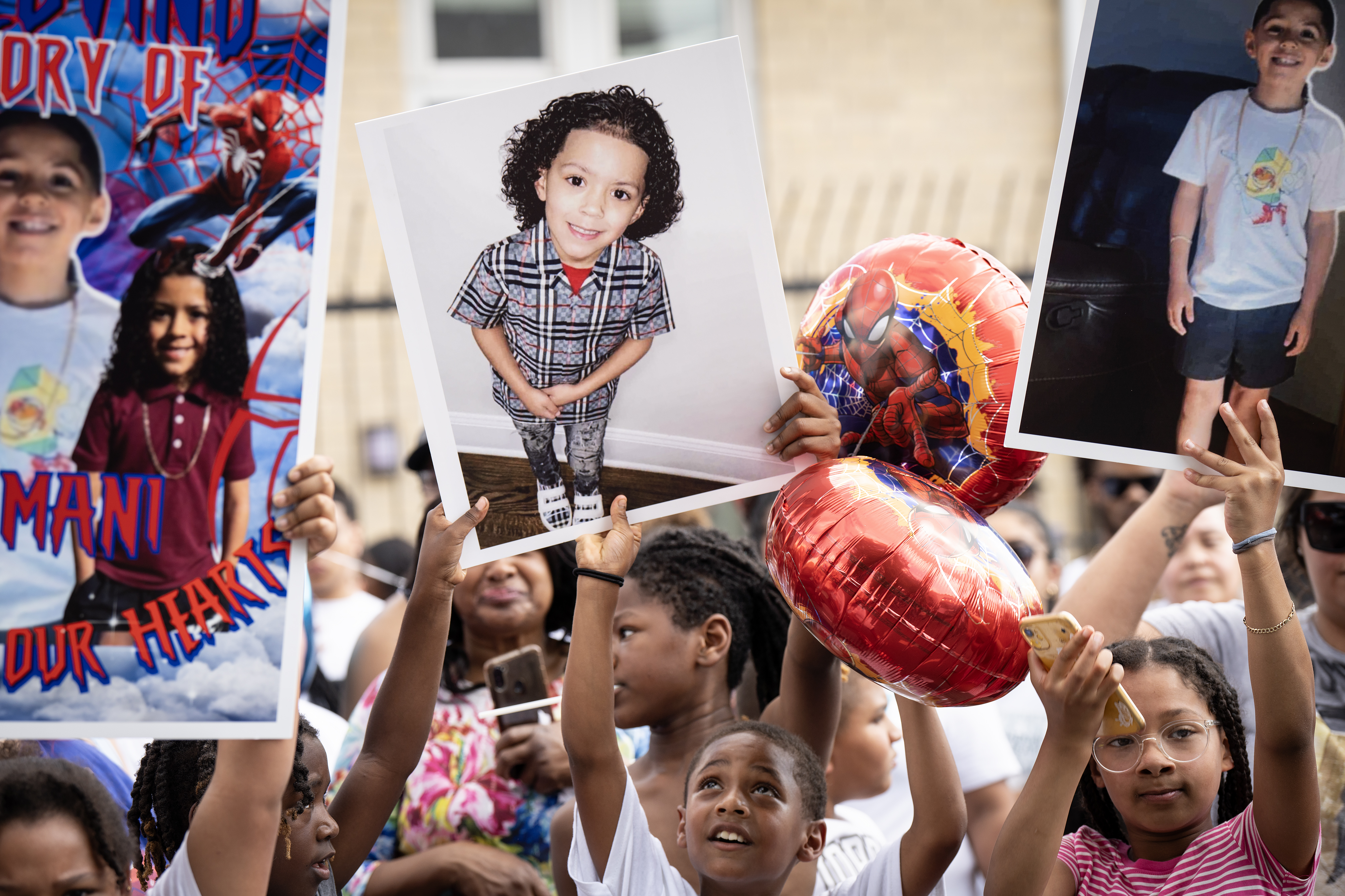 Children gather during a vigil, June 19, 2024, for 7-year-old...