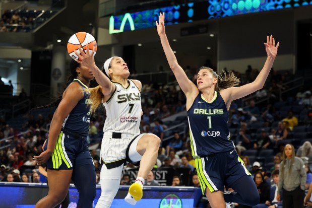 Chicago Sky guard Chennedy Carter (7) tries to get past Dallas Wings guard Sevgi Uzun (1) to score during the game at Wintrust Arena on June 20, 2024. (Eileen T. Meslar/Chicago Tribune)