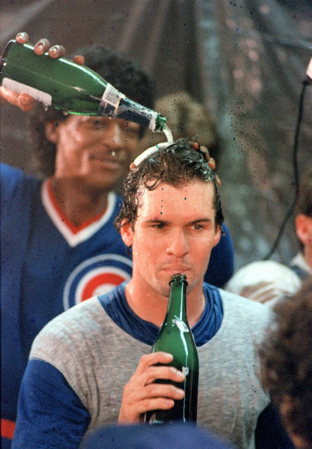 Ryne Sandberg sips Champagne in the locker room after beating Pittsburgh to clinch the National League East on Sept. 24, 1984. (Charles Cherney/Chicago Tribune)