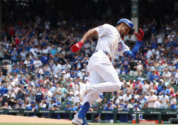 Cubs third baseman Christopher Morel rounds the bases after hitting a home run in the third inning against the Mets at Wrigley Field on June 22, 2024, in Chicago. (John J. Kim/Chicago Tribune)