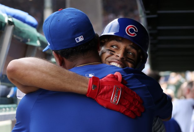 Cubs third baseman Christopher Morel, right, celebrates in the dugout after hitting a home run in the third inning against the Mets at Wrigley Field on June 22, 2024, in Chicago. (John J. Kim/Chicago Tribune)