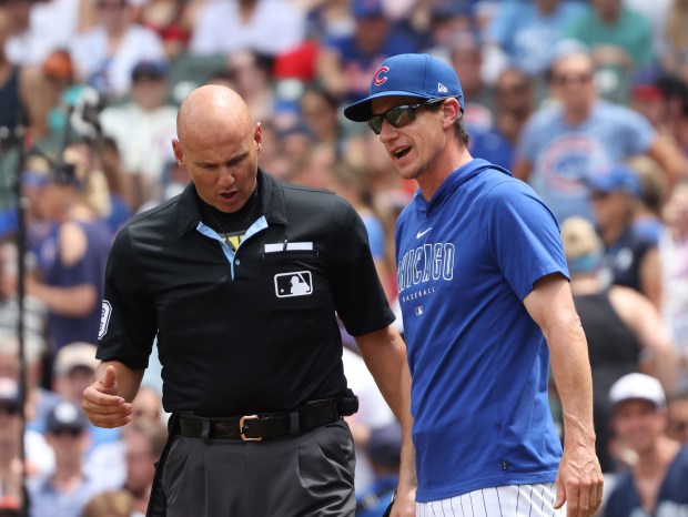 Cubs manager Craig Counsell, right, argues a strikeout call with home plate umpire Vic Carapazza to end the second inning against the Mets at Wrigley Field on June 22, 2024, in Chicago. (John J. Kim/Chicago Tribune)
