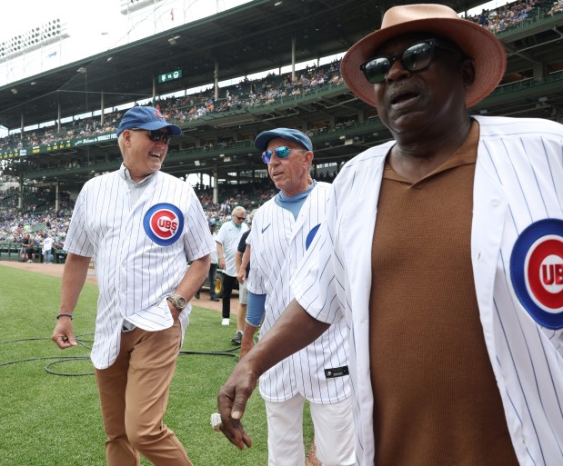 Former Cubs players Ryne Sandberg, from left, Bobby Dernier and Gary Matthews arrive to be recognized as part of the 1984 Cubs before a game against the Mets on June 22, 2024, at Wrigley Field. (John J. Kim/Chicago Tribune)