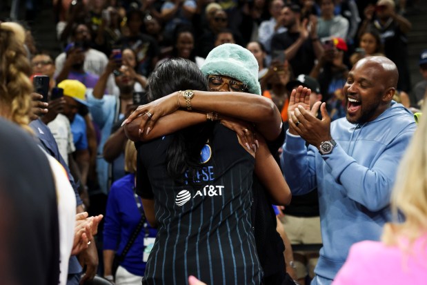 Chicago Sky forward Angel Reese (5) hugs former WNBA player Sheryl Swoopes after defeating the Indiana Fever 88-87 at Wintrust Arena on June 23, 2024. (Eileen T. Meslar/Chicago Tribune)