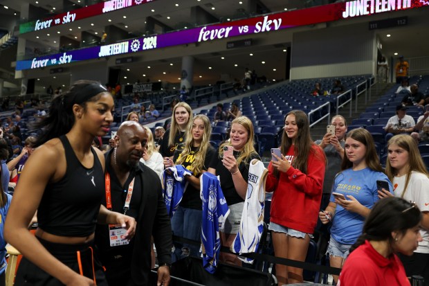 Fans line up as Chicago Sky forward Angel Reese exits the court before the game against the Indiana Fever at Wintrust Arena on June 23, 2024. (Eileen T. Meslar/Chicago Tribune)