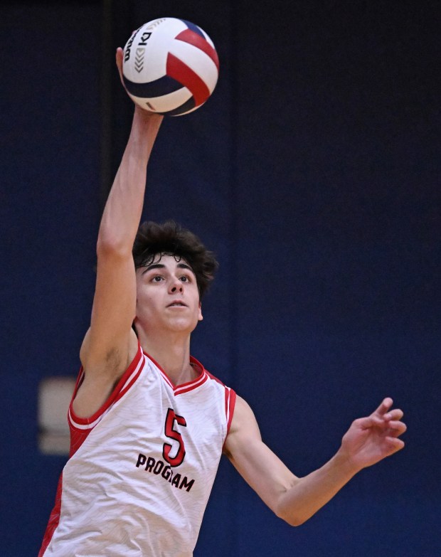 Marist's Ethan Kuziela (5) during the 1st game of Saturday's semifinal match against Glenbard West, June 1, 2024. Marist won the match, 28-26, 26-24. (Brian O'Mahoney for the Daily Southtown)