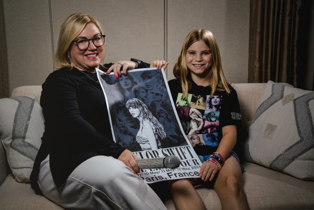 Courtney Goodman and her 10-year-old daughter, Amelia, traveled to Paris to attend a Taylor Swift concert. (E. Jason Wambsgans/Chicago Tribune)