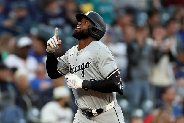 White Sox designated hitter Luis Robert Jr. celebrates his tying home run in the ninth inning against the Mariners on June 12, 2024, at T-Mobile Park in Seattle. (Steph Chambers/Getty)