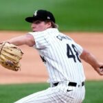 Chicago White Sox starting pitcher Jonathan Cannon winds up during the first inning of the team's baseball game against the Houston Astros on Tuesday, June 18, 2024, in Chicago. (AP Photo/Charles Rex Arbogast)