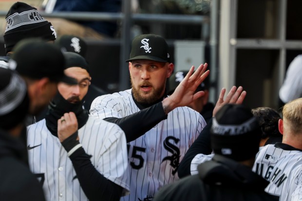 Chicago White Sox pitcher Garrett Crochet (45) high fives teammates in the dug out during a game between the Chicago White Sox and the Atlanta Braves on Tuesday, April 2, 2024, at Guaranteed Rate Field in Chicago. (Vincent Alban/Chicago Tribune)