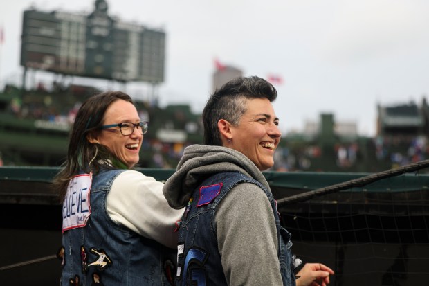 Cheryl and Clair Rollman-Tinajero watch the Red Stars warm up before their game against Bay FC at Wrigley Field on June 8, 2024. (Eileen T. Meslar/Chicago Tribune)
