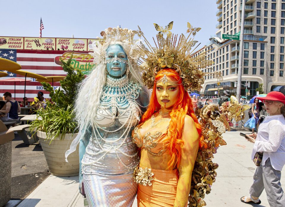 Amanda Berrios, Margaret Perdomo coming off the Subway, about to walk in the parade.