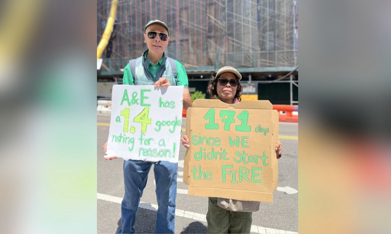 Tenants rally Saturday outside the Sunnyside building where they lived before the December fire.