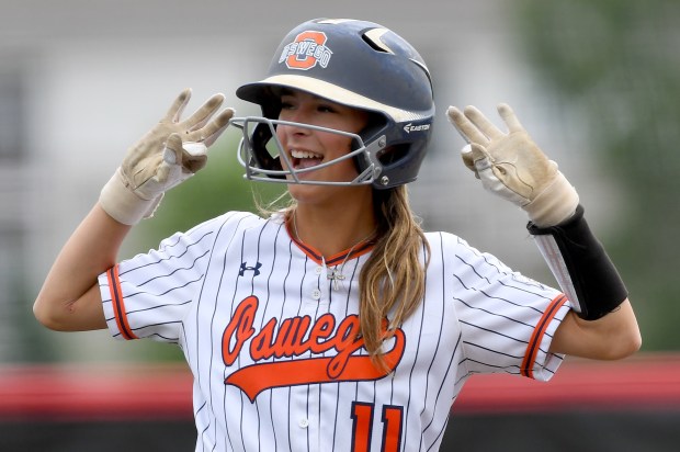 Oswego's Kaylee LaChappell (11) gets to second and celebrates. Oswego defeated Mundelein 12-7 in the Class 4A third-place game at Louisville Slugger Sports Complex in Peoria.(Rob Dicker / Daily Southtown)