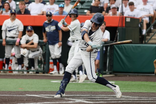 Lemont's Jacob Parr (19) swings at a pitch during the Class 3A State Championship game against Crystal Lake in Joliet on Saturday, June 8, 2024. (Troy Stolt/for the Daily Southtown)