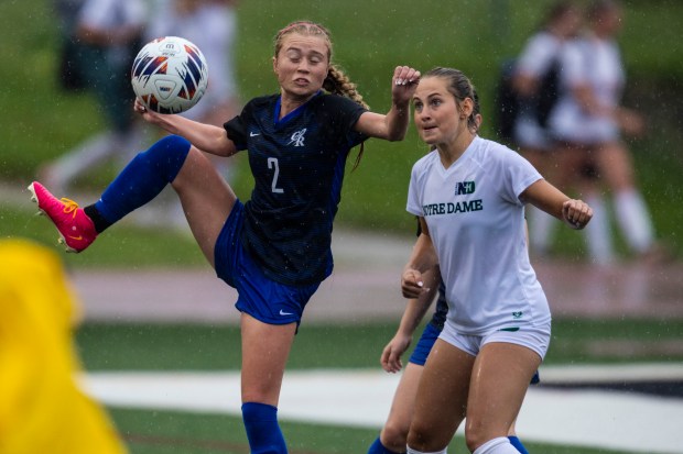 Burlington Central's Ellie Elders (2) gets a leg up on a ball against Peoria Notre Dame in the Class 2A third-place game in Naperville on Saturday, June 1, 2024. (Vincent D. Johnson/for the Beacon-News)