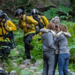 Photo of missing hiker hugging his family after he was found