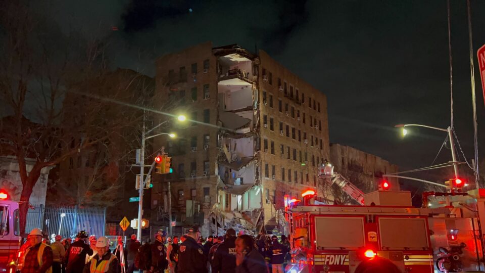 Officials respond to the structural collapse in the Bronx on Monday.