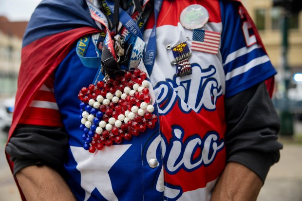 A decorative Puerto Rican flag worn by Marvin Perez during the 46th Puerto Rican People's Day Parade on on June 8, 2024, in Humboldt Park in Chicago. (Vincent Alban/Chicago Tribune)