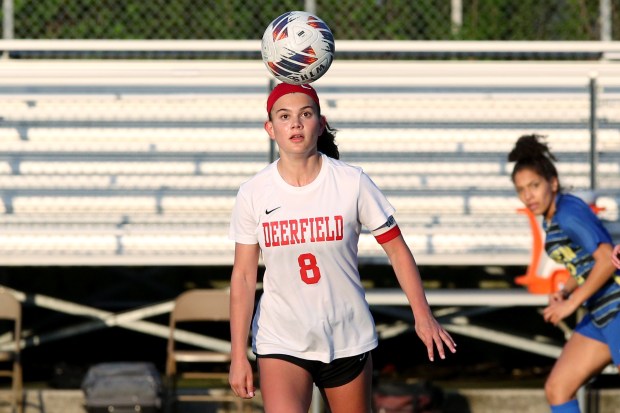 Deerfield's Emily Fox (8), trying to control a bouncing ball, during the soccer game on Thursday, May 9, 2024, in Gurnee. (Mark Ukena for the Lake County News-Sun)