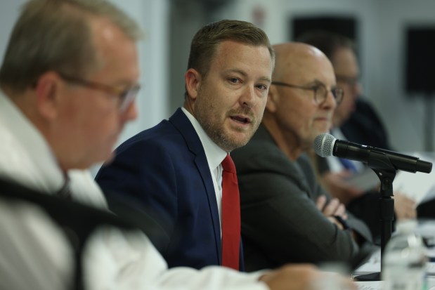 Commission on Government Forecasting and Accountability co-chair state Rep. C.D. Davidsmeyer calls the meeting to order during a hearing on the proposed closure of Stateville Correctional Center during a multiyear rebuild, at the Clarion Hotel and Conference Center, June 11, 2024, in Joliet. (John J. Kim/Chicago Tribune)