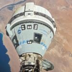 The Starliner spacecraft on NASA's Boeing Crew Flight Test is pictured docked to the Harmony module's forward port on June 13 as the International Space Station orbited 262 miles above Egypt's Mediterranean coast. - NASA