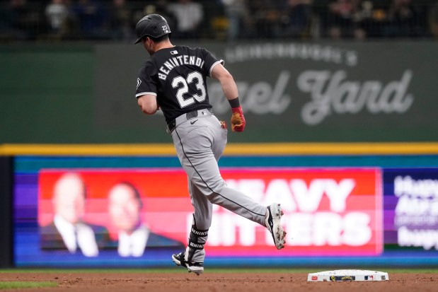 Chicago White Sox's Andrew Benintendi rounds the bases after hitting a solo home run during the third inning of a baseball game against the Milwaukee Brewers, Saturday, June 1, 2024, in Milwaukee. (AP Photo/Aaron Gash)