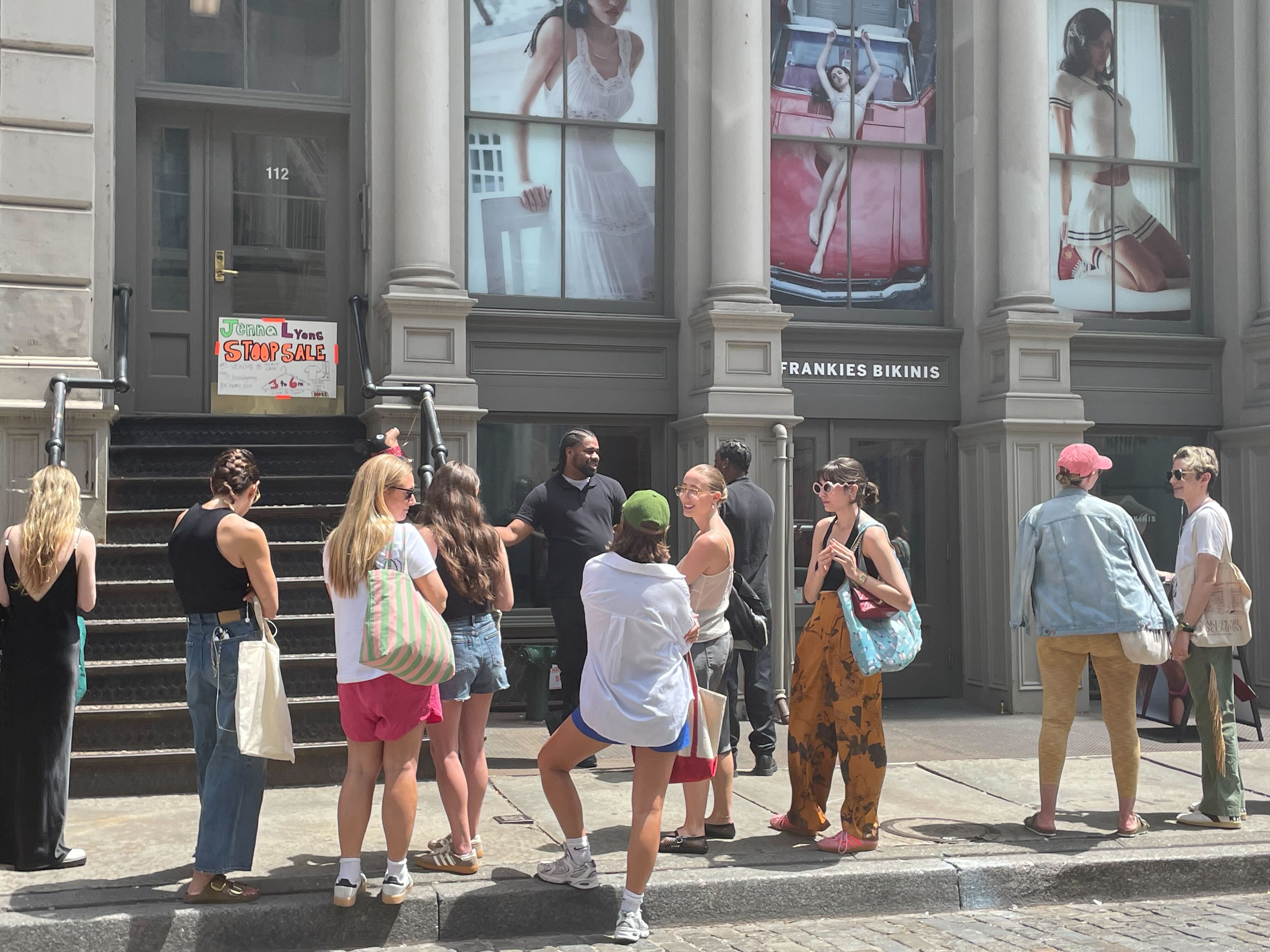 A line forms outside of the SoHo loft where the stoop sale was being held.